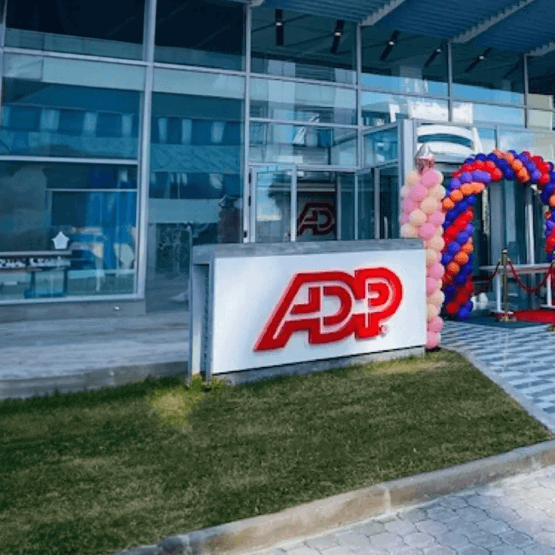 a entrance to a building with balloons