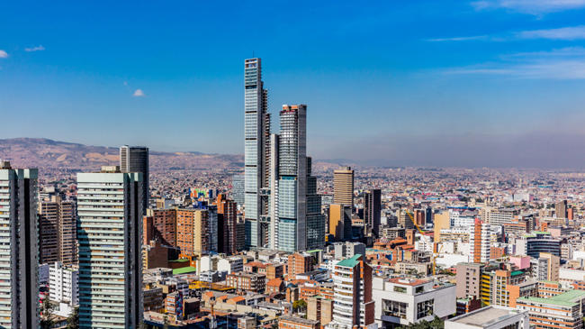 a city with tall buildings and roads