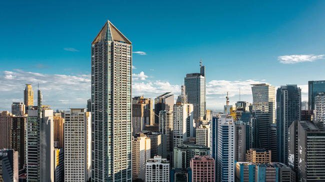 a city skyline with tall buildings