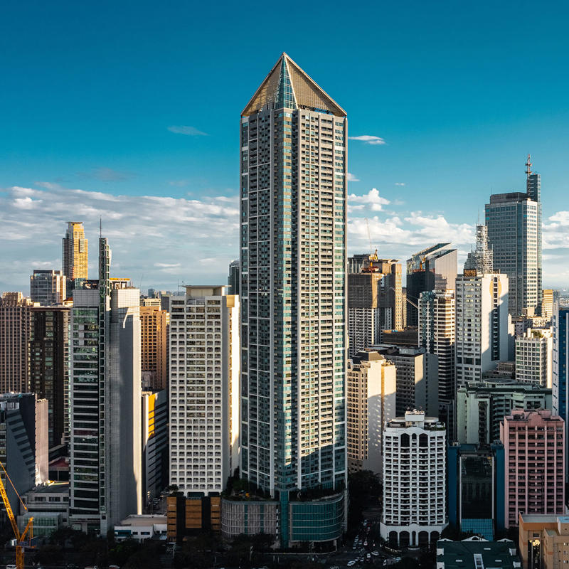 a city skyline with tall buildings