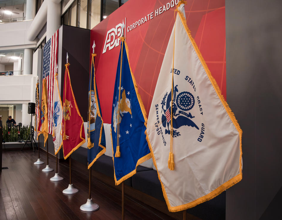 a row of flags on a wall