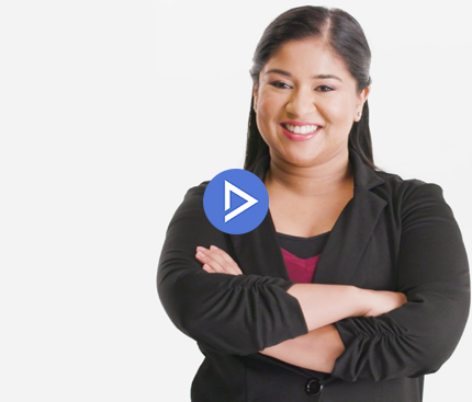 a person smiling with her arms crossed